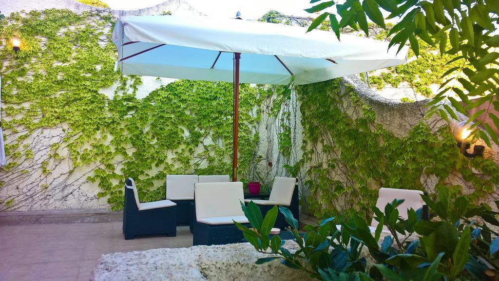 Hotel Bellavista S'Archittu Bagian luar foto